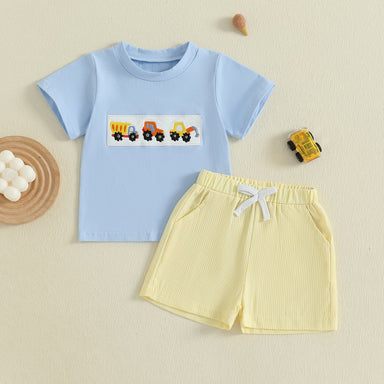 MiniMachines Sommerset för Pojkar | T-shirt med Byggfordon & Randiga Gula Shorts | Bomull & Polyester | 0–4 År | Bekväm Sommaroutfit