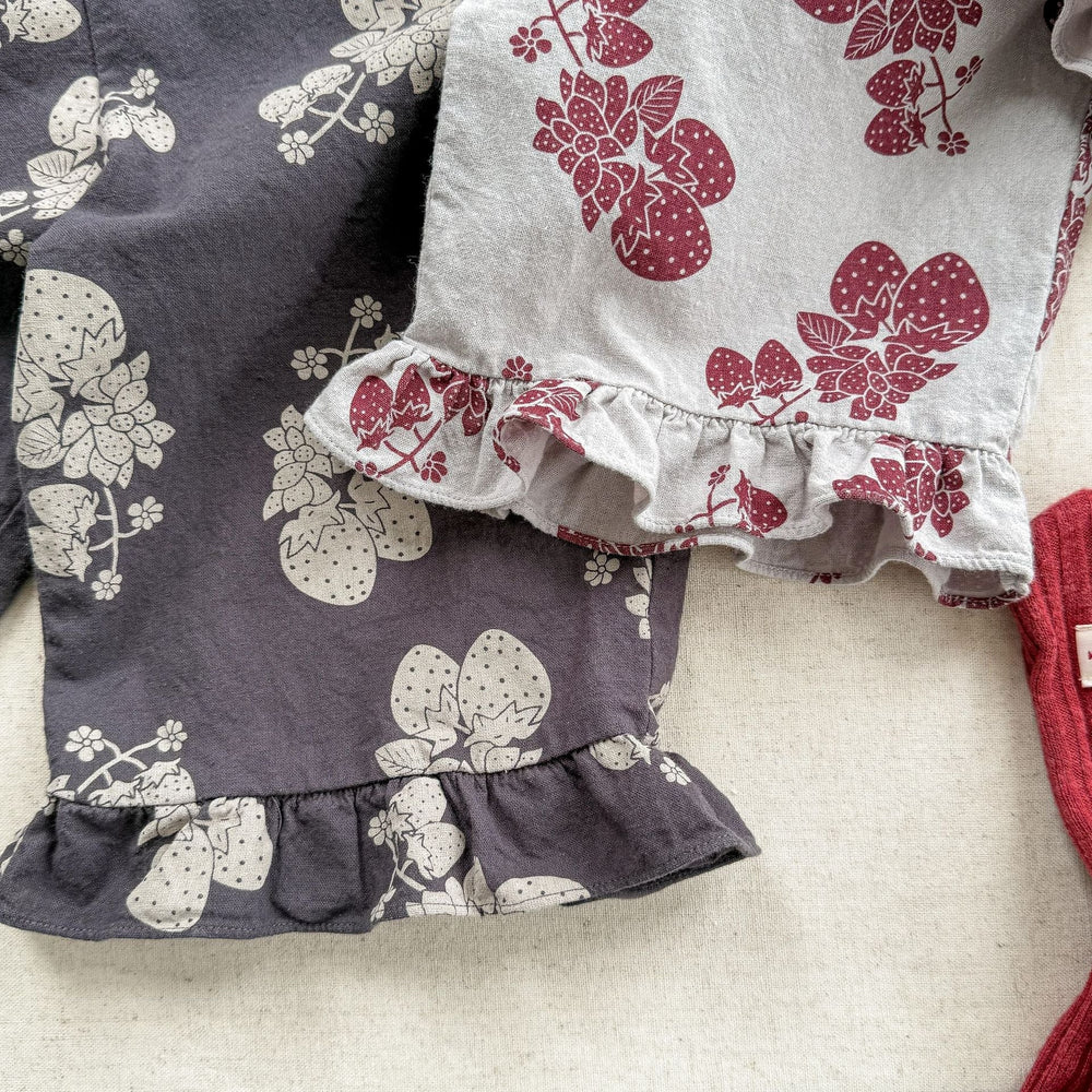 Lunea Kids Flora Volangbyxdress Flicka – Sommarjumpsuit i bomull – Blommönster – Volanger – 0–6 år – Luftiga barnkläder