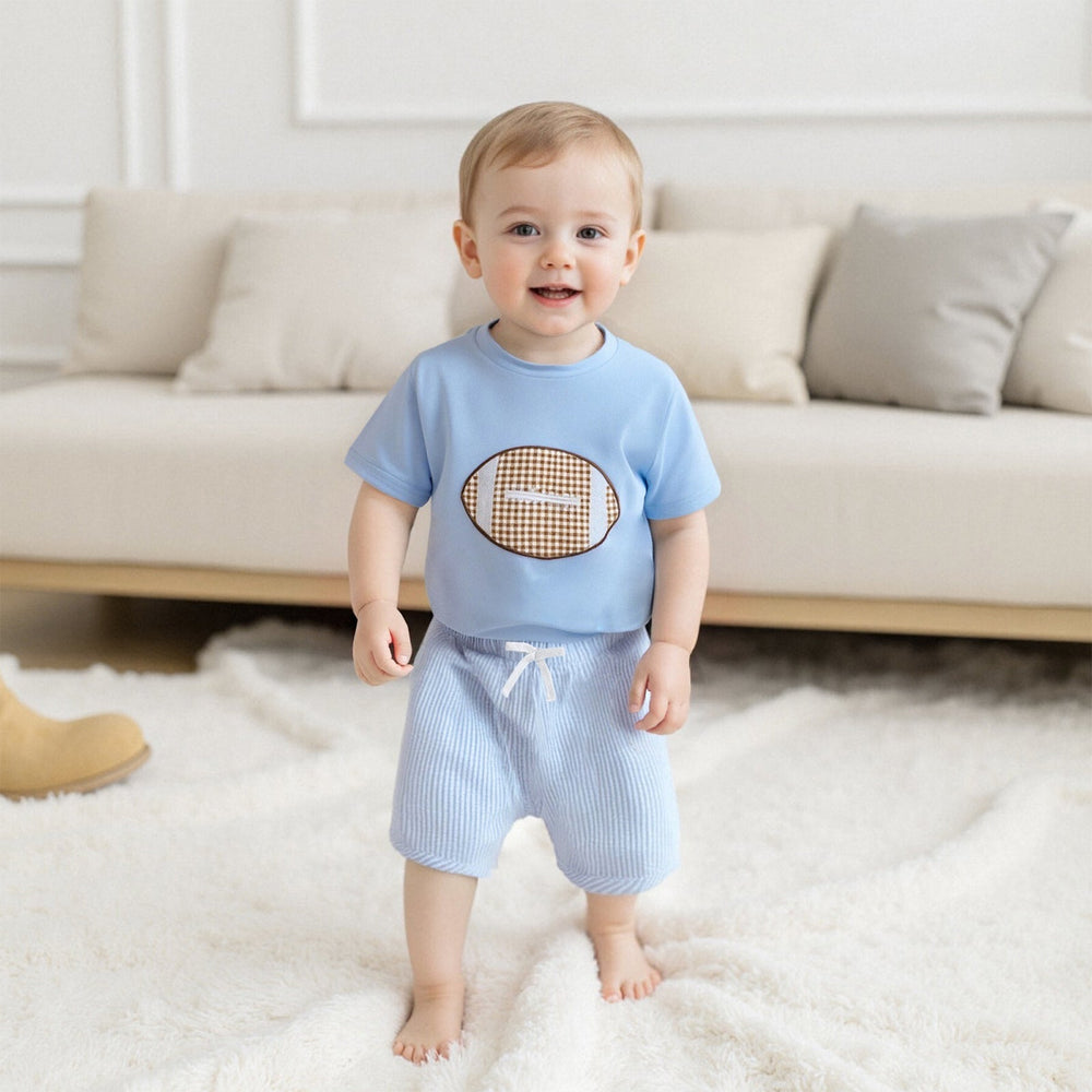 Touchdown Sommerset för Pojkar | T-shirt med Rugbyboll & Ljusblå Shorts | Bomull & Polyester | 6 mån–4 år | Sportig Babyoutfit
