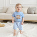 Touchdown Sommerset för Pojkar | T-shirt med Rugbyboll & Ljusblå Shorts | Bomull & Polyester | 6 mån–4 år | Sportig Babyoutfit