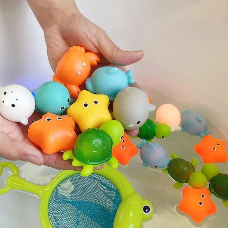 Lysande badleksaker för barn – Flytande LED-figurer för badet
