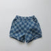 Nolu Checker Shorts – Rutiga Barnshorts Blå – Unisex Sommarshorts i Bomull – Resårmidja – Storlek 0–6 år